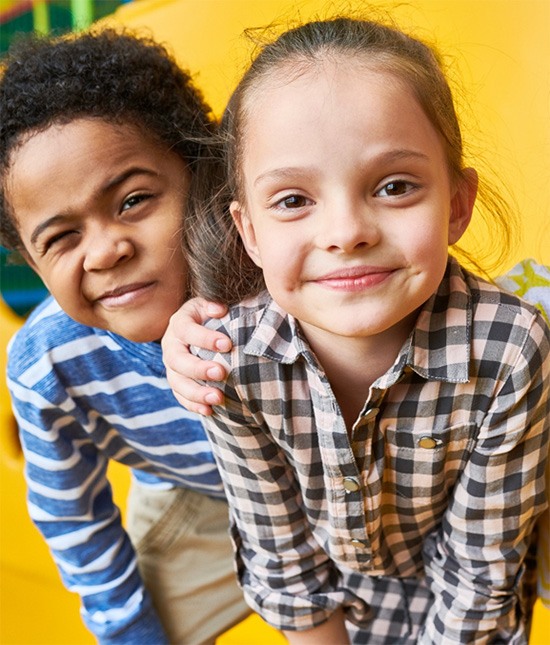 Kids enjoying activities inside a community recreation center