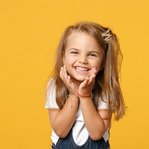 a closeup of a child smiling
