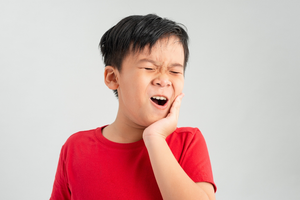 a child with a chipped tooth